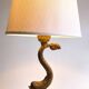 Patinated bronze lamp and marble in Hollywood Regency Style