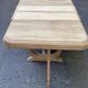 Art Deco dining table with a central pedestal, stripped in solid oak, with 2 extensions.