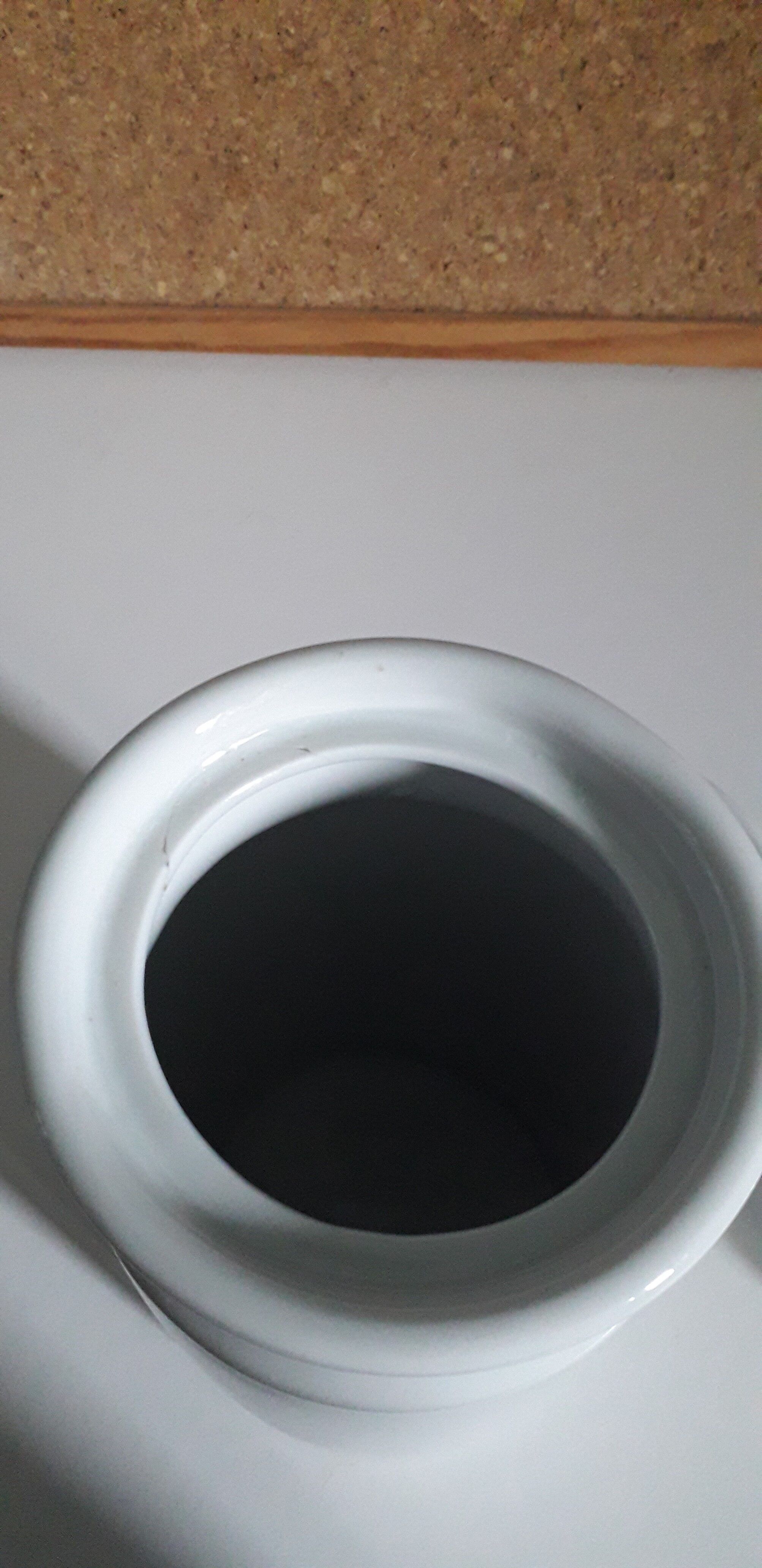 White porcelain pot for storing pickles or fruits with alcohol
