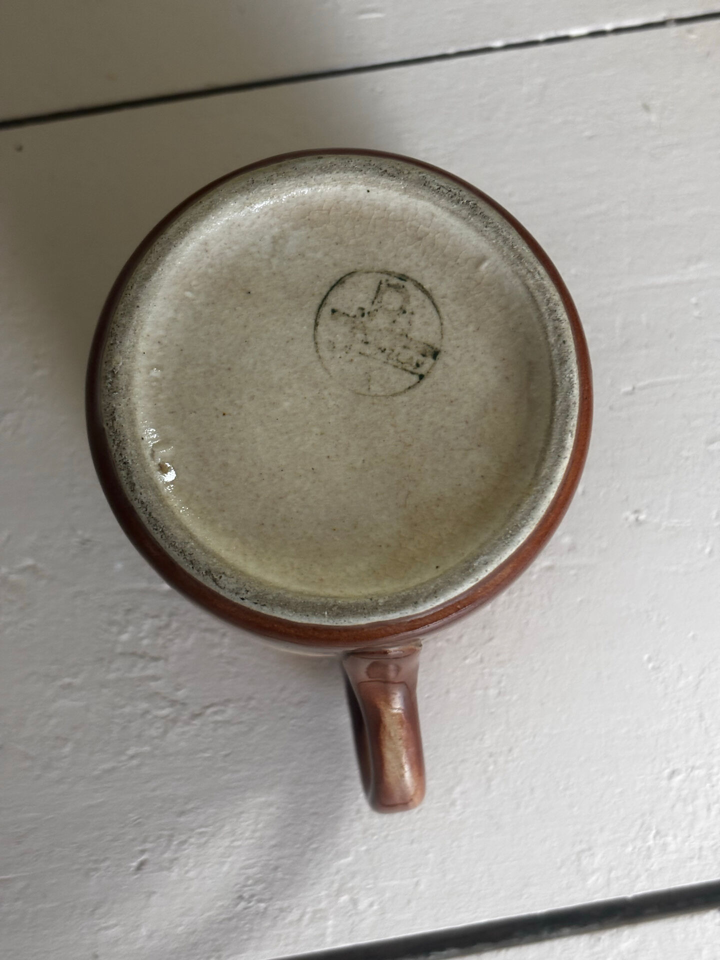 Vintage 70s old ceramic mug with a brown cubic graphic pattern.