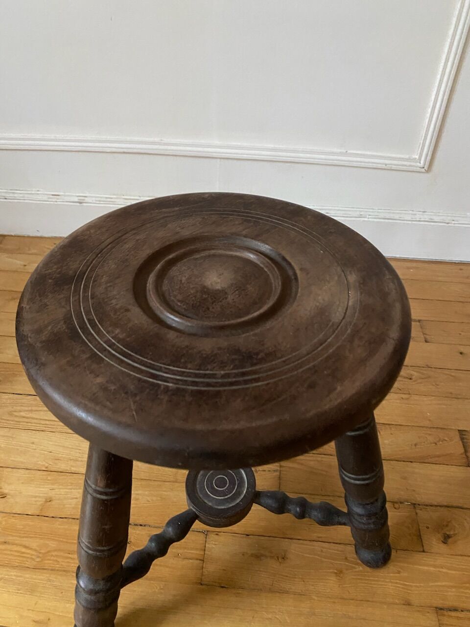 Turned wooden tripod stool