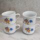 Coffee cup with floral design in porcelain