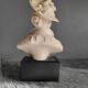 Elegant woman bust with alabaster shawl and black base of the 1950s