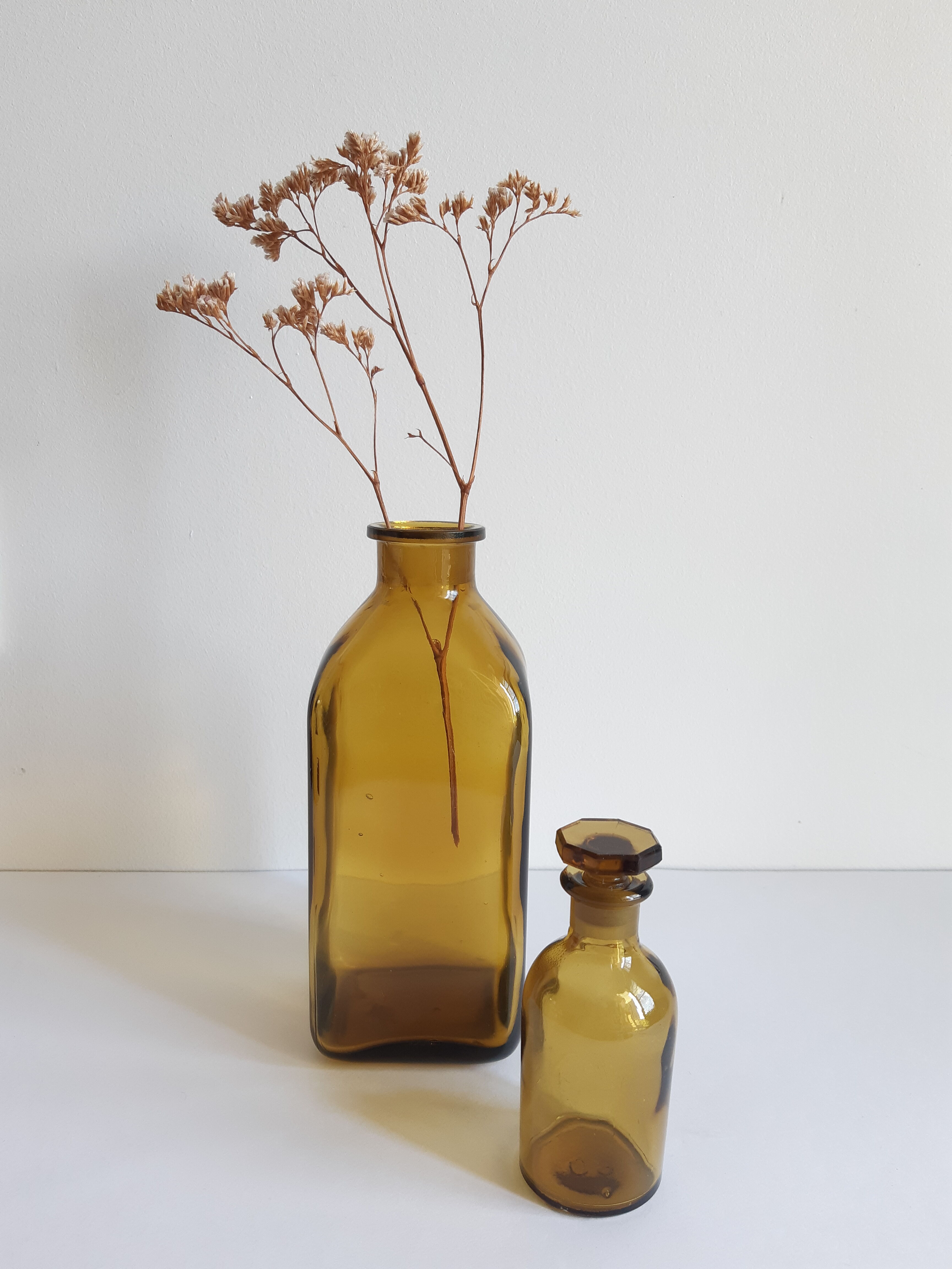 Set of 2 vintage glass bottles