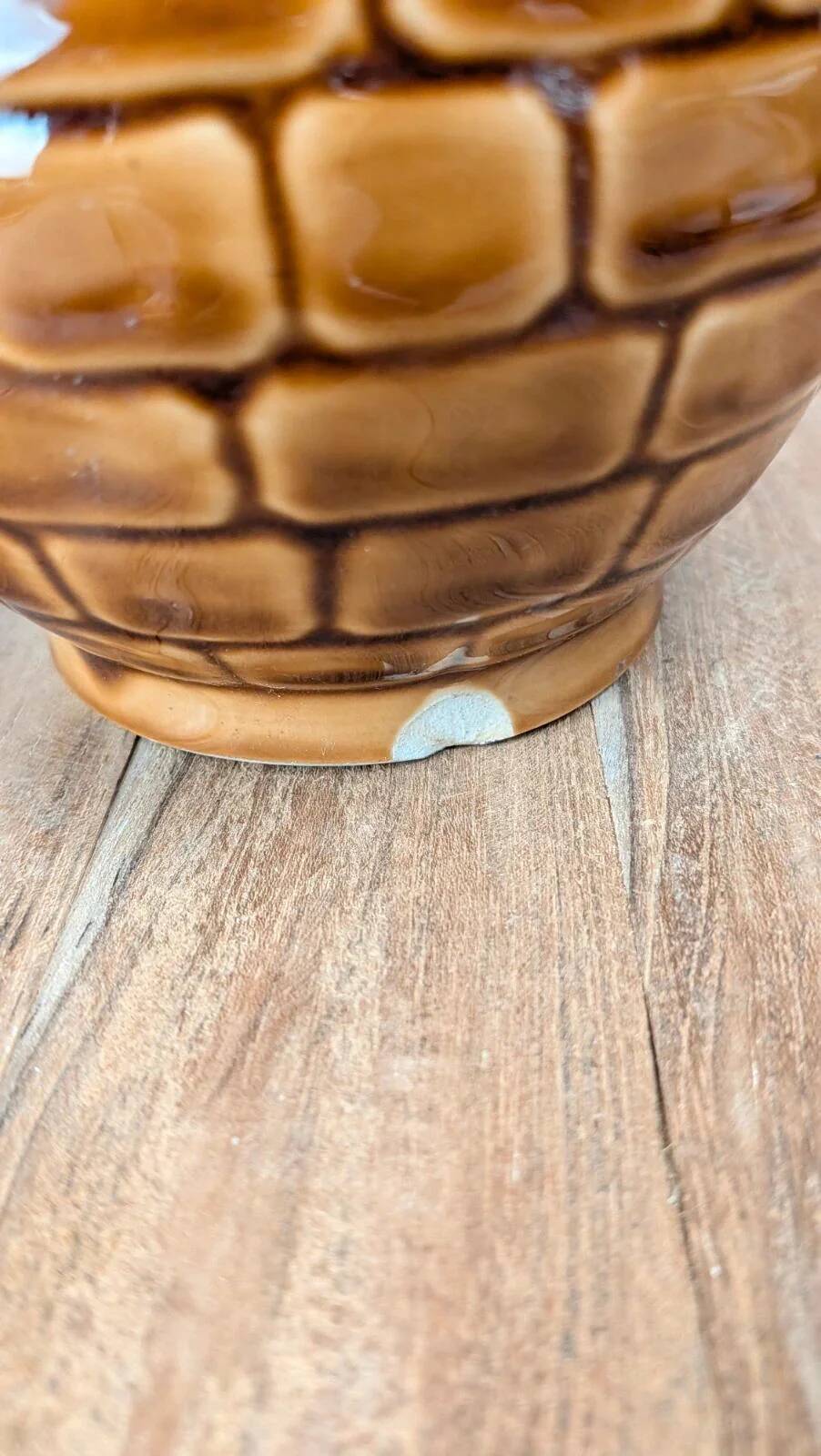Vintage Sarreguemines pitcher with brown relief decoration.