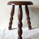 Tripod stool with coil legs