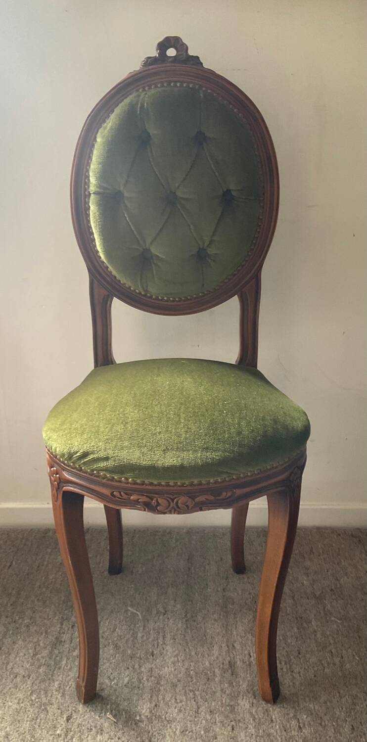Antique wooden and velvet upholstered chair