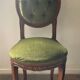 Antique wooden and velvet upholstered chair