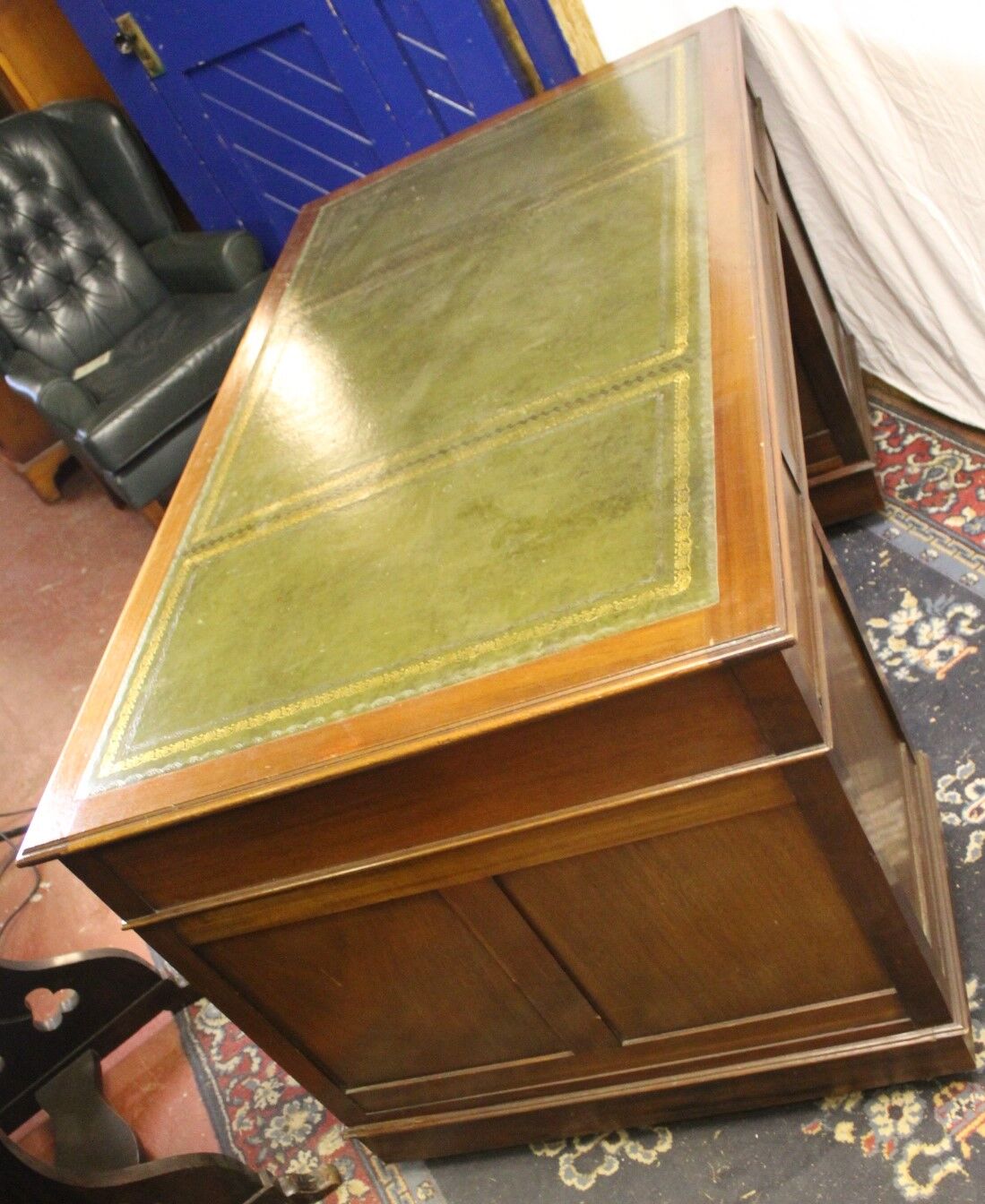 Solid mahogany pedestal desk with green leather inset ,