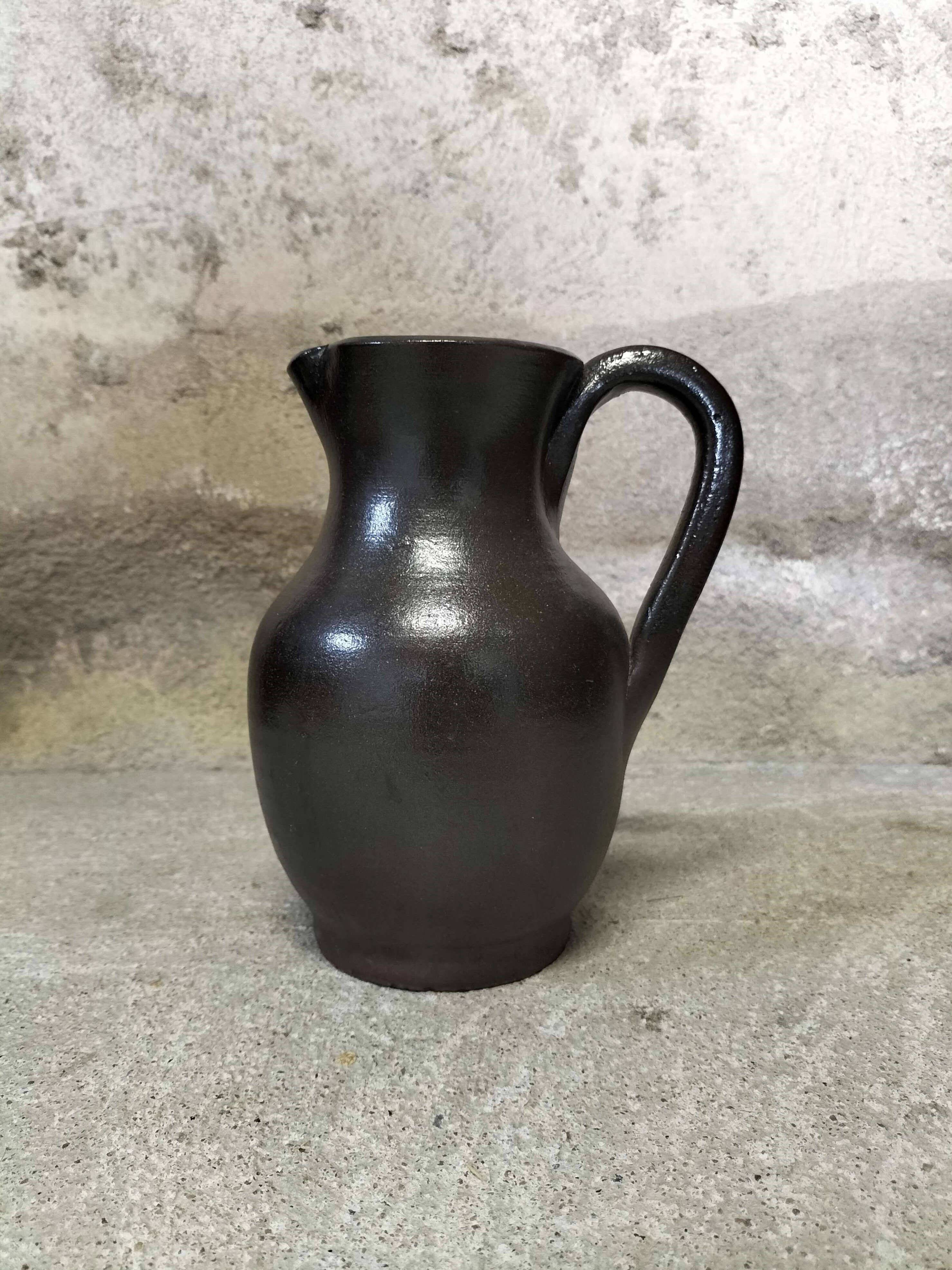 Ceramic pitcher signed Jean Dubost