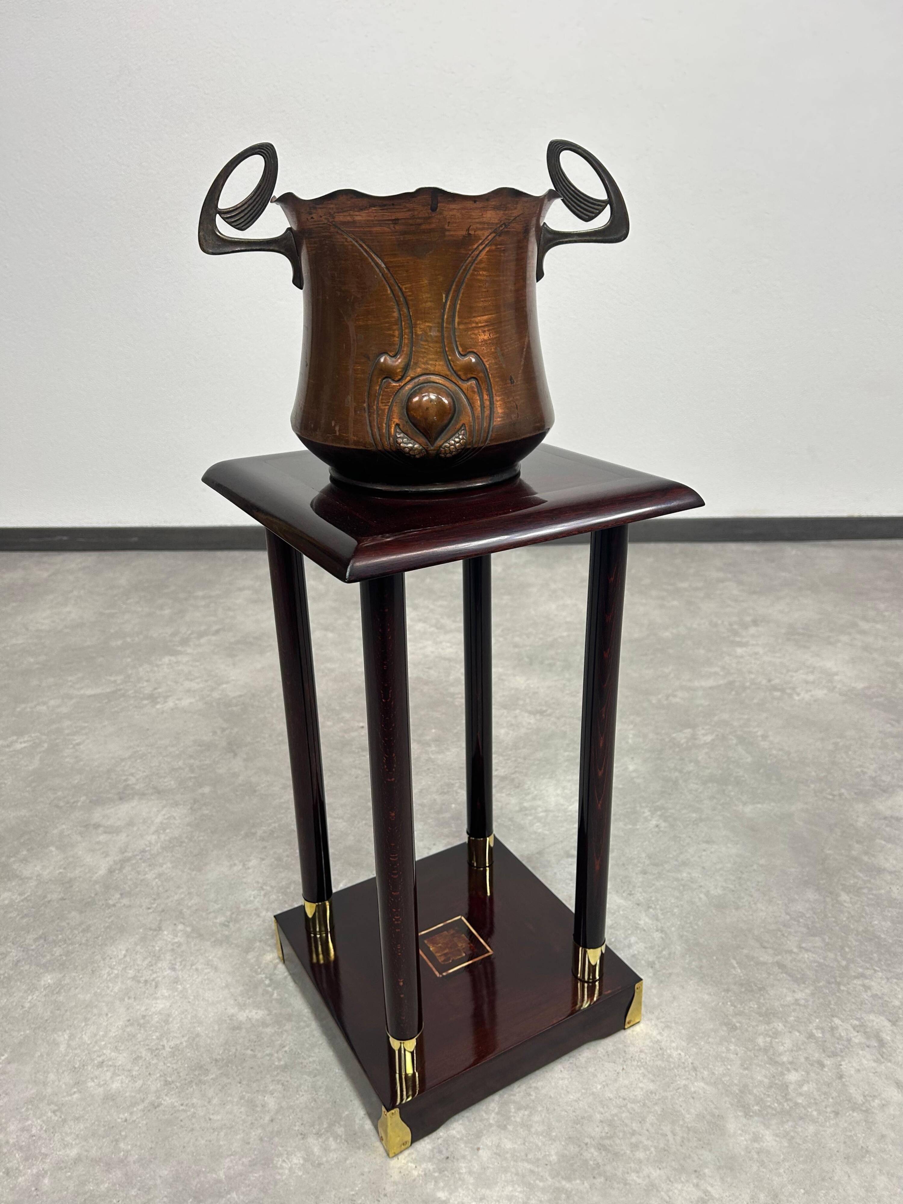 Secession pedestal in mahogany