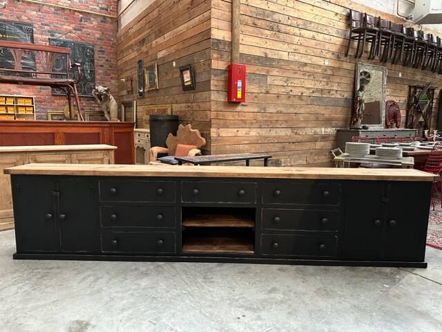 Old piece of furniture transformed into a TV stand