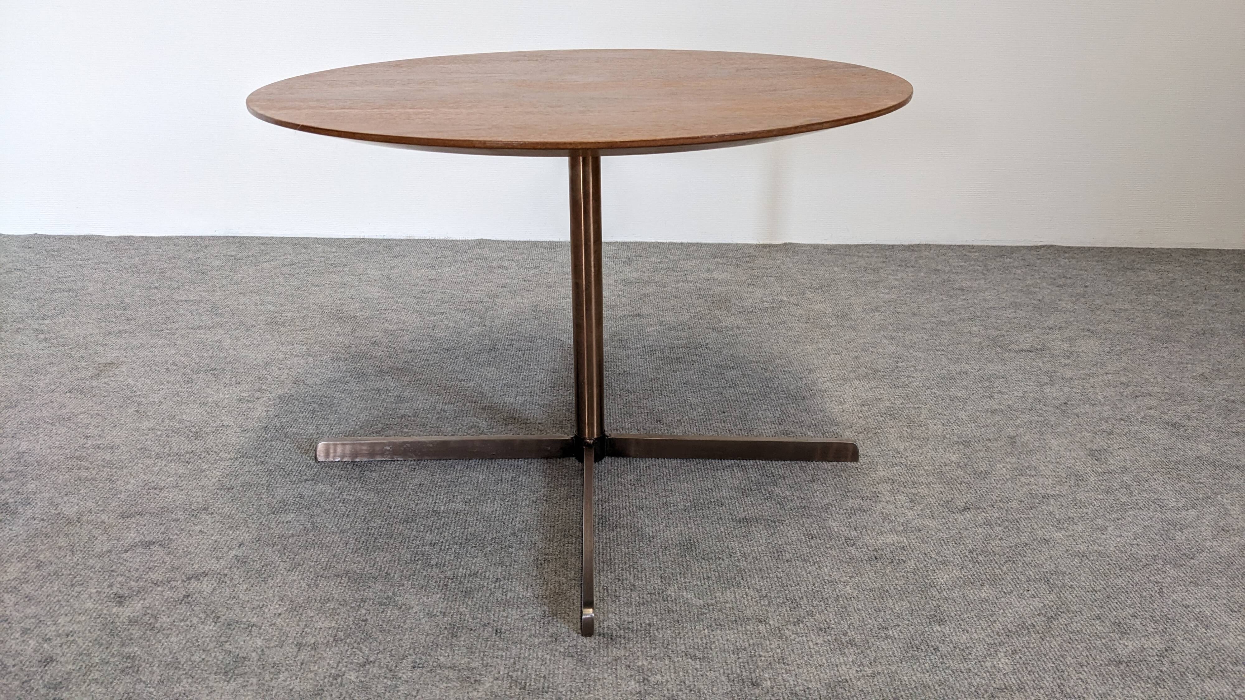 Contemporary round side table or end table.