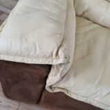 Fauteuil avec pouf en cuir et daim