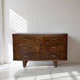 A vintage Italian chest of drawers, made of veneered walnut and solid wood,