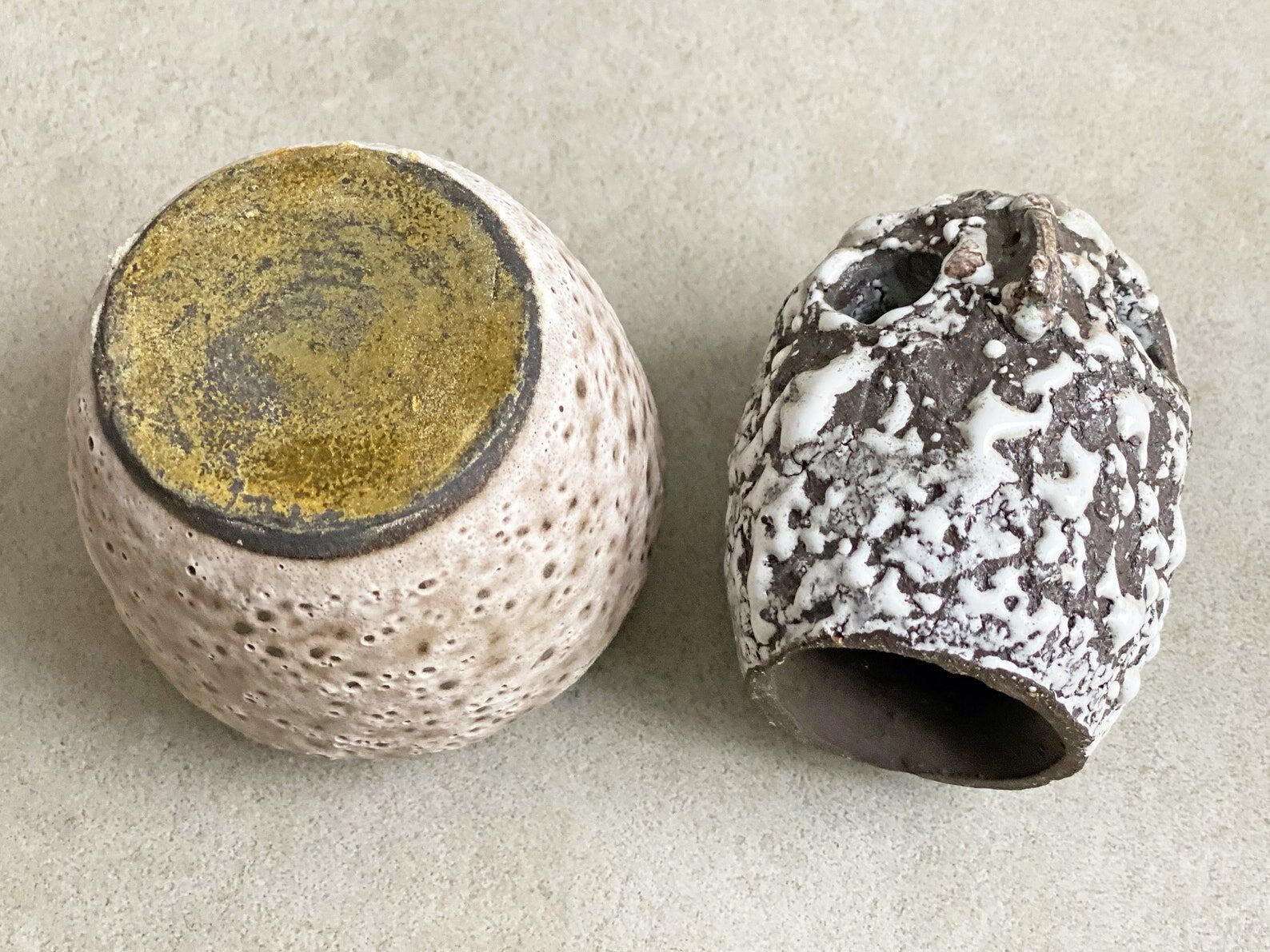 Composition of a small vintage ceramic vase and a ceramic owl figurine / statue