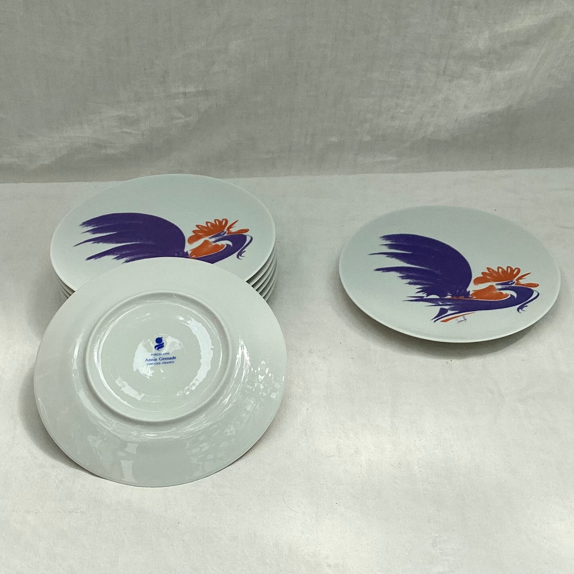 Set of eight limoges porcelain dessert plates Annie Grenade