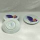 Set of eight limoges porcelain dessert plates Annie Grenade