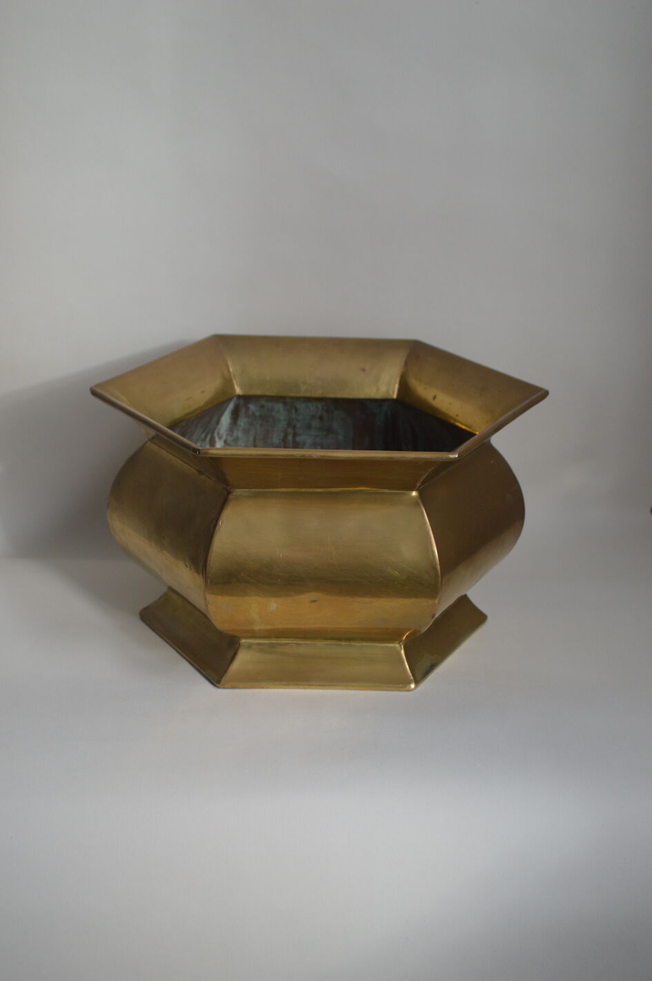 Brass pot cover