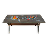 Vintage ceramic coffee table with chrome and wood accents.