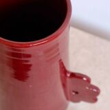 Handmade ceramic abstract vase with asymmetrical handles burgundy flower
