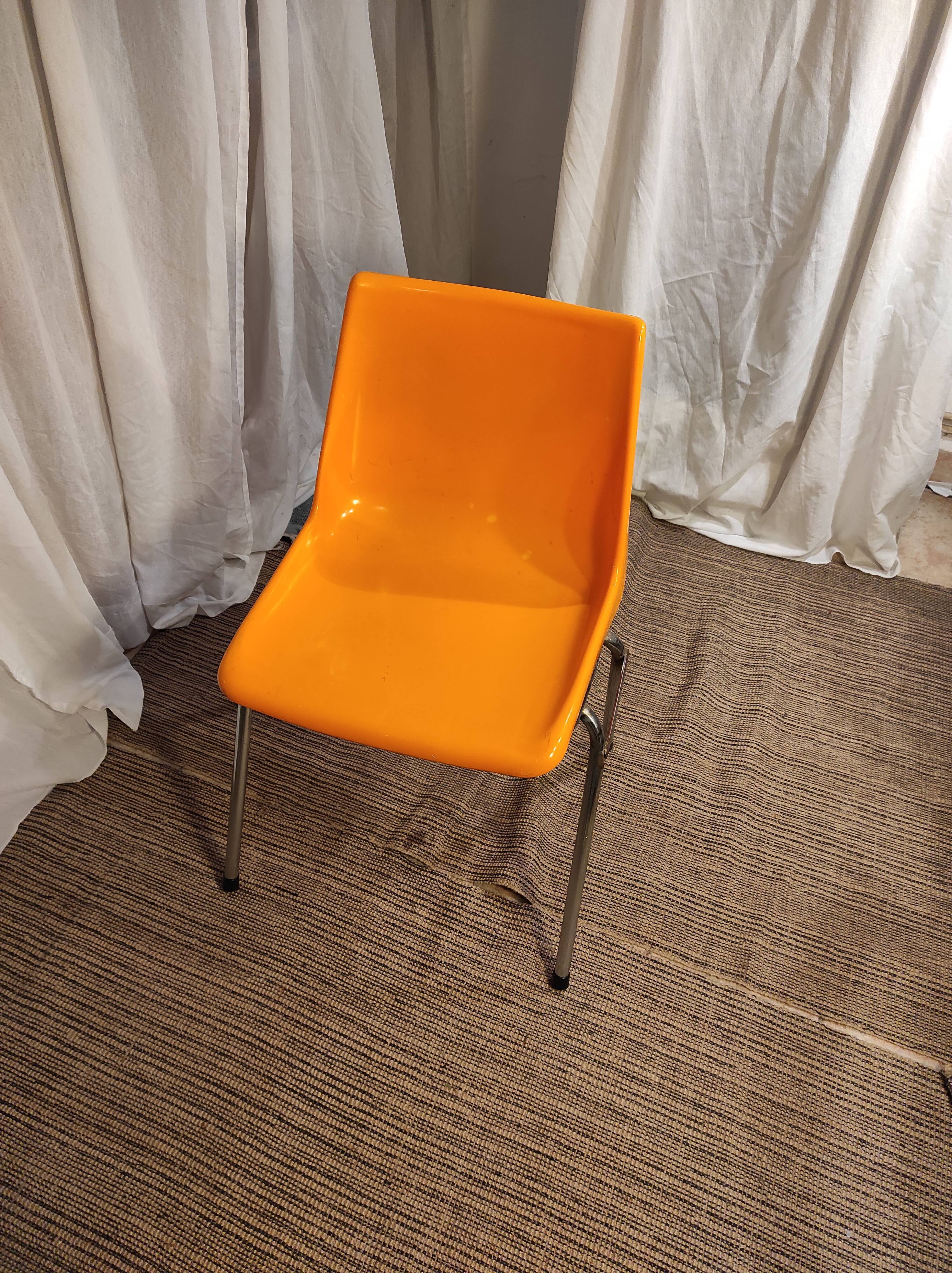 Orange plastic chair 1970