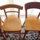 Set of 4 light wood bistro chairs stamped Baumann and Thonet.