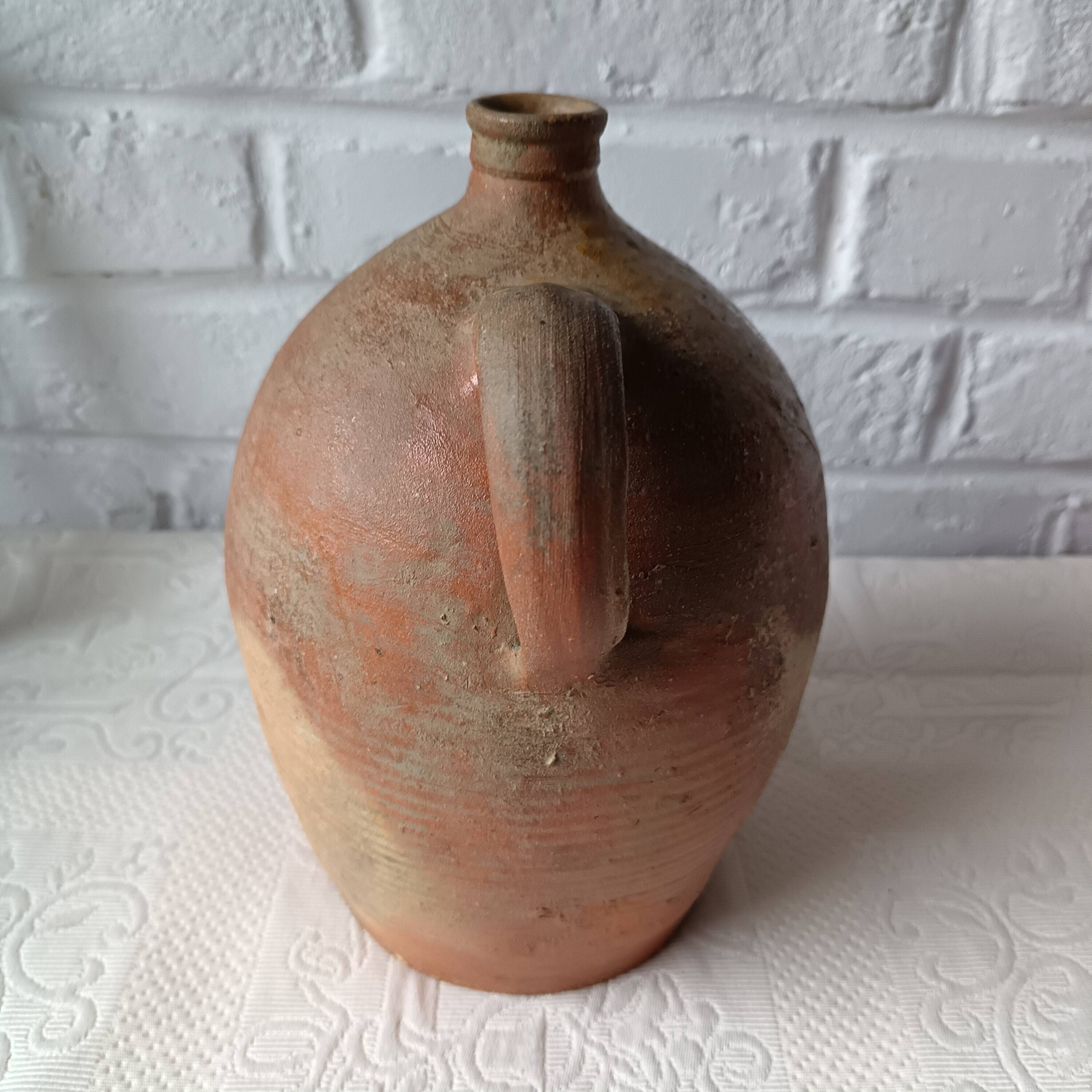 Old beige-brown stoneware jar France