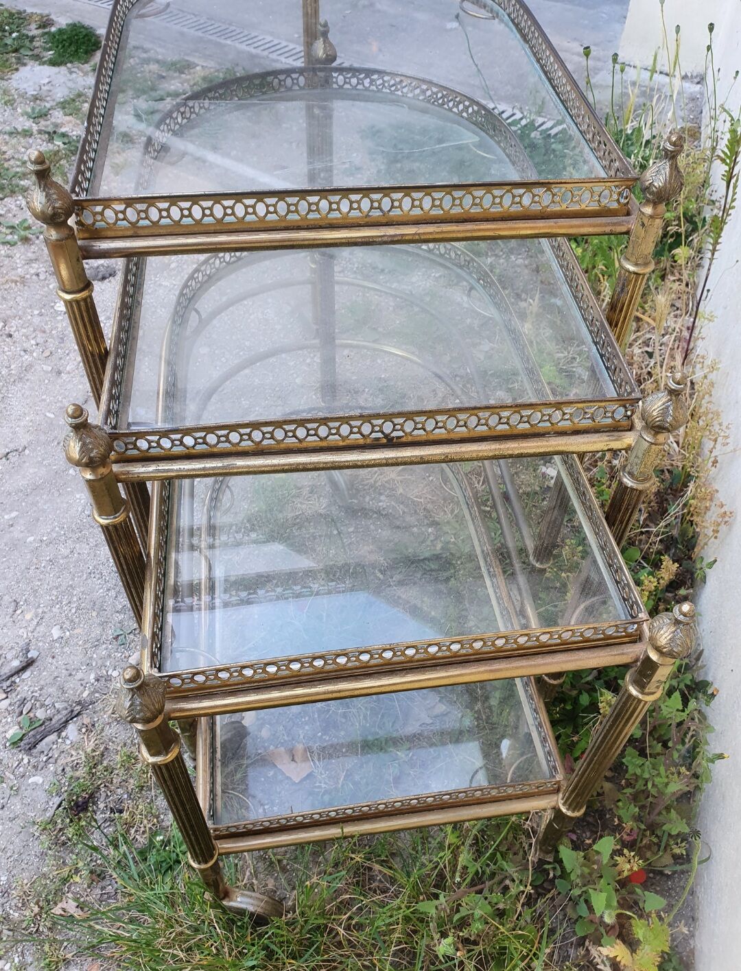 Set of nesting brass and glass serving trolleys