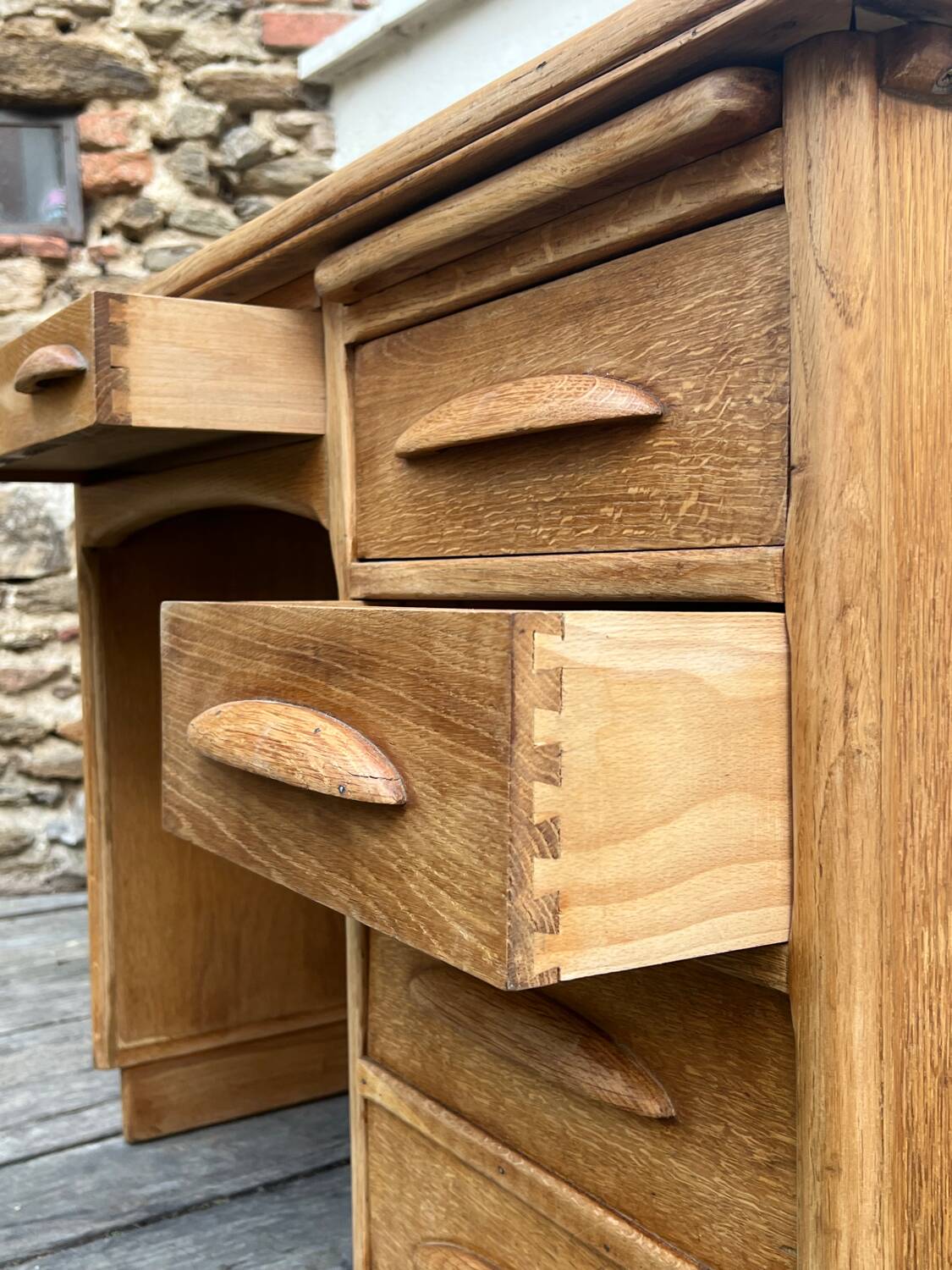 Antique light oak desk from the 1950s with 4 drawers