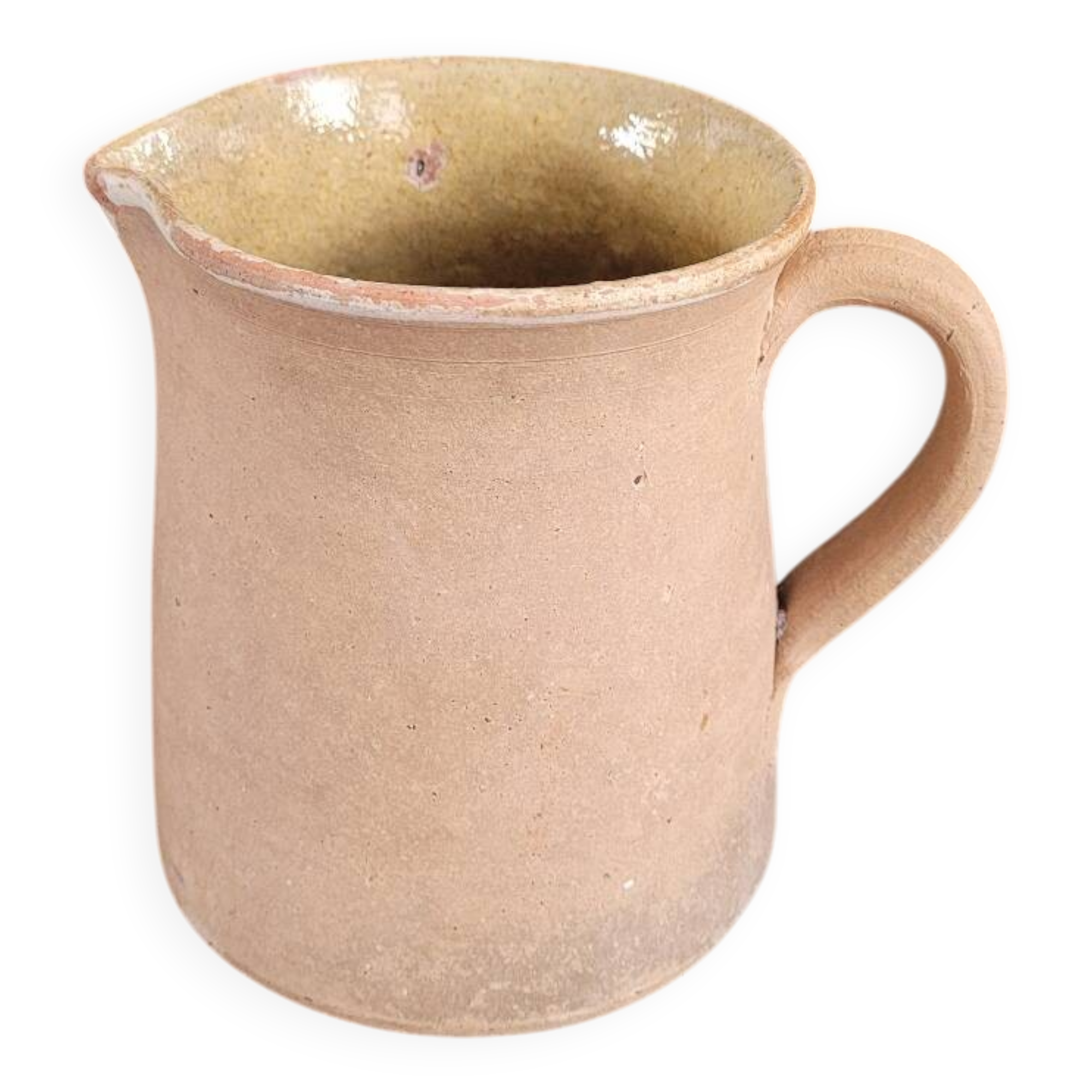 Antique milk jug in glazed terracotta