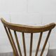 Pair of Baumann Menuet chairs, Honey patina, White vinyl seats