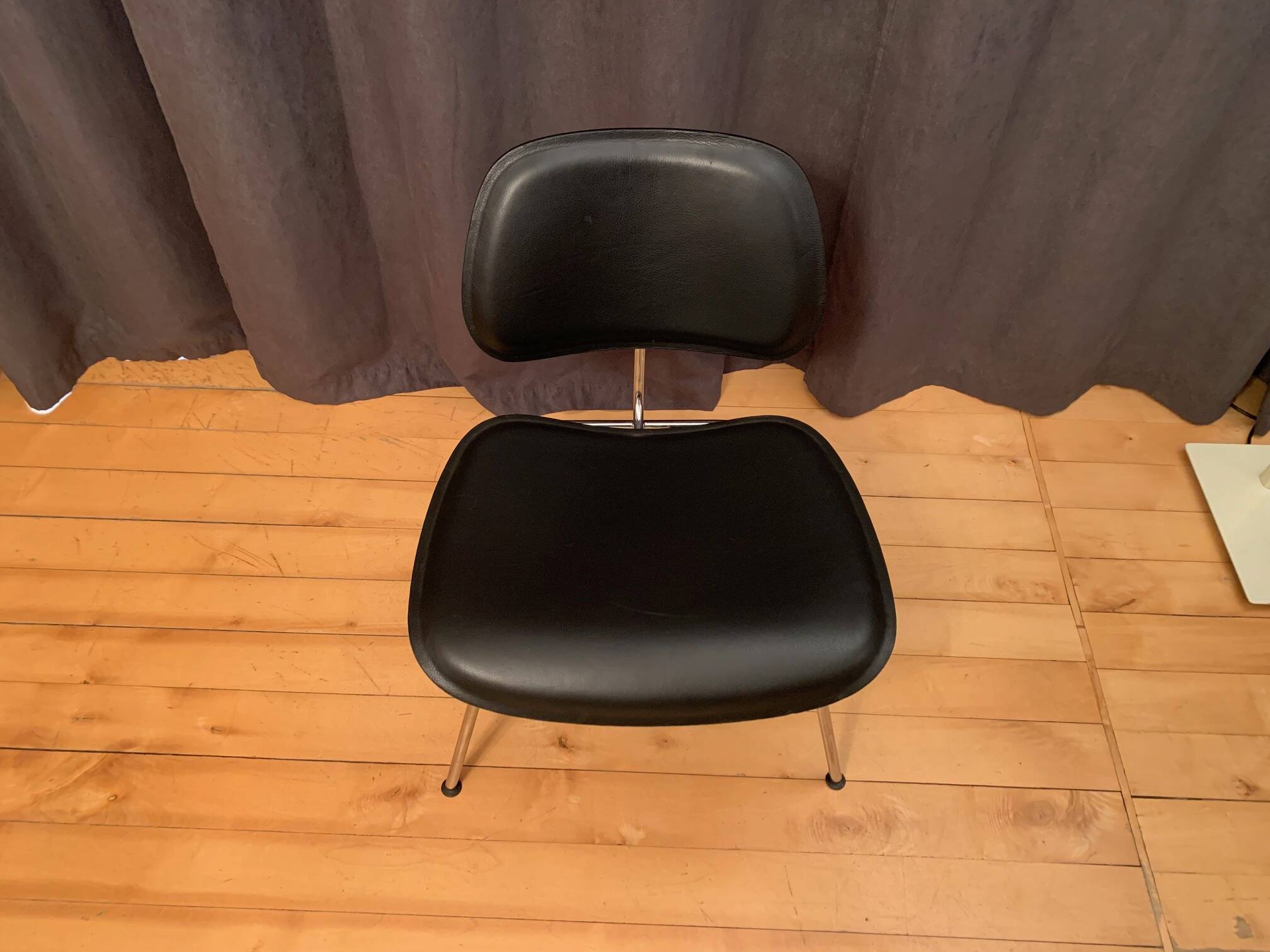 Leather armchair LCM designed by Charles & Ray Eames, Vitra