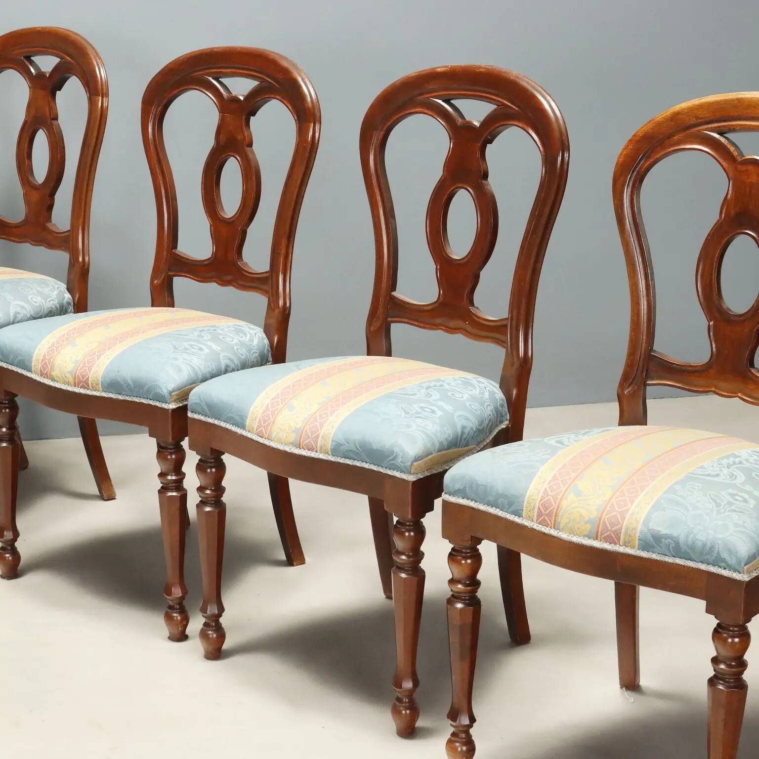 Antique walnut chairs with curved legs, Italy, mid-19th century.