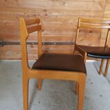 5 vintage black skai chairs