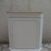 Vintage English corner cabinet enhanced in pearl grey, wooden top.
