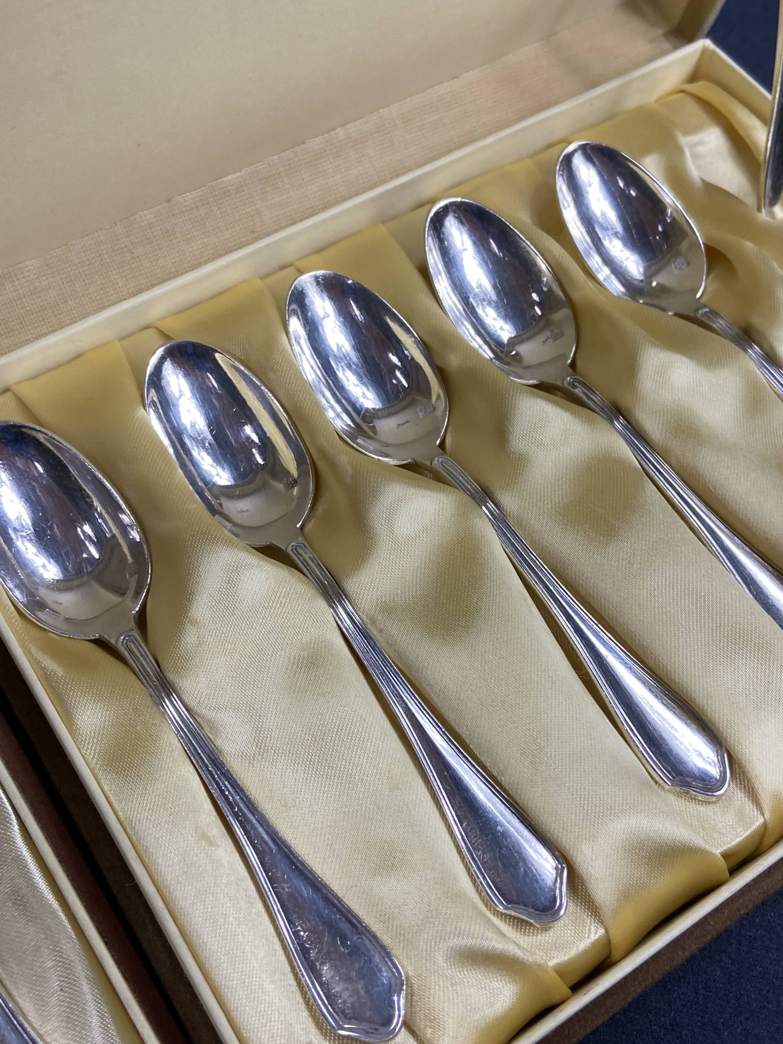 Complete set of 12 Louis XV style mocha spoons in silver-plated metal, Hermès