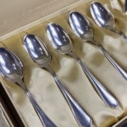 Complete set of 12 Louis XV style mocha spoons in silver-plated metal, Hermès