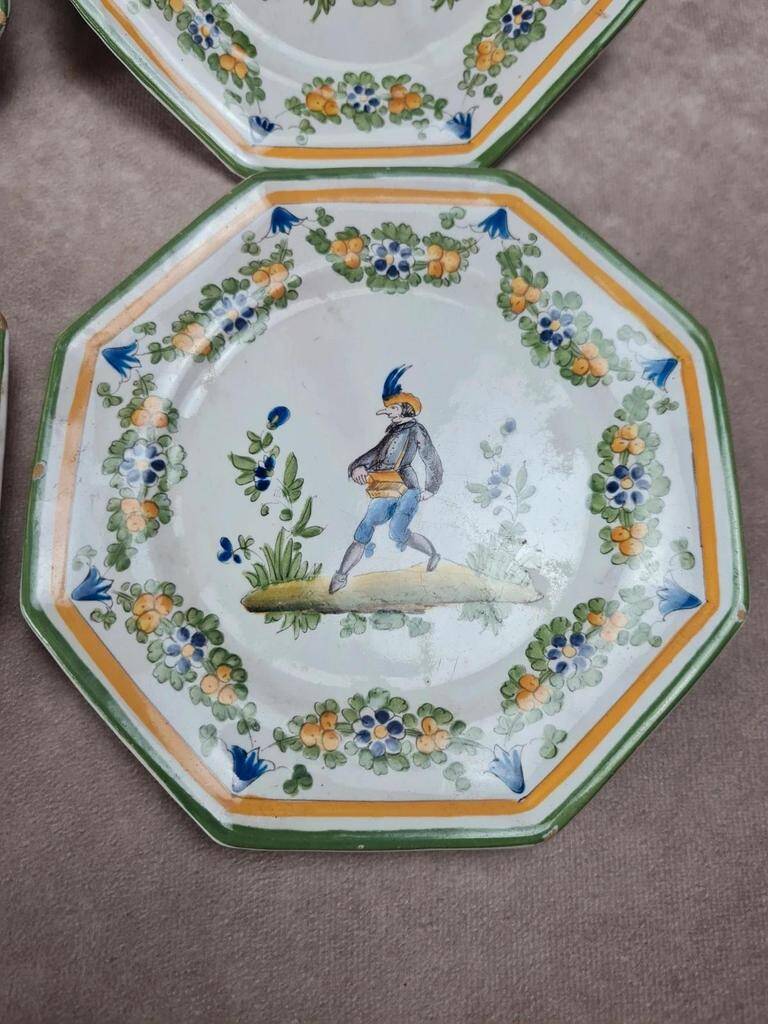 Set of 12 small antique plates by Alfred Renoleau, different designs.