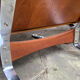 Lounge chair and ottoman black leather and teak multiplex, 1960