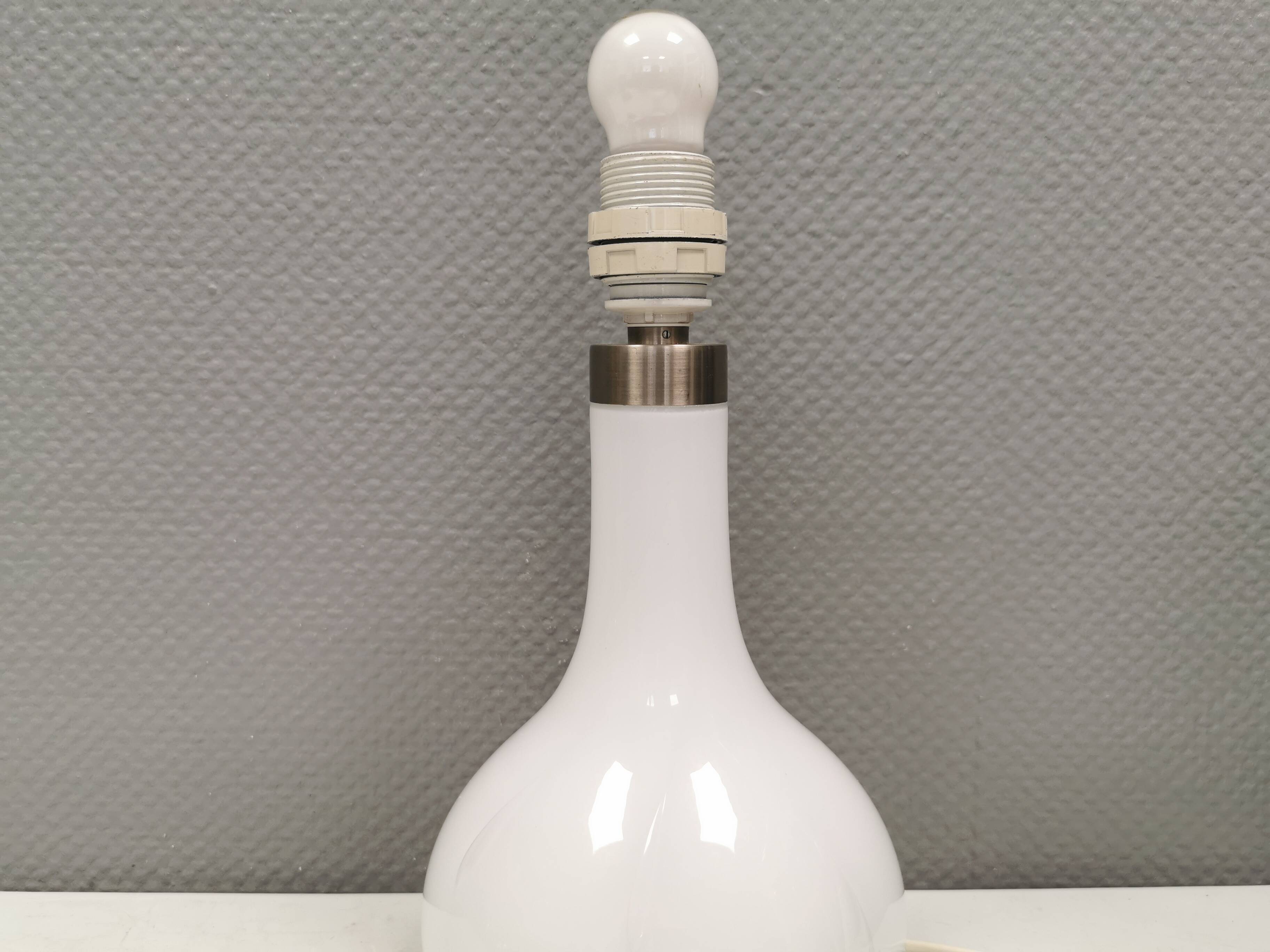 Helios table lamp, teardrop shaped, made of white opal glass. 1986 Denmark