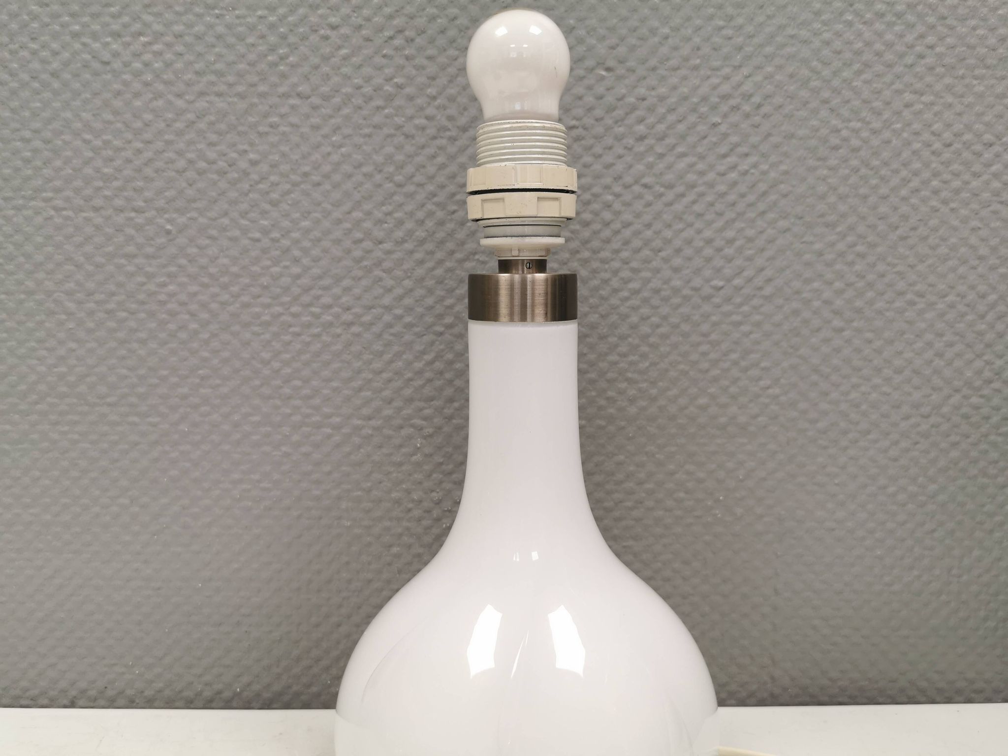 Helios table lamp, teardrop shaped, made of white opal glass. 1986 Denmark