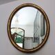 Oval mirror with gilded wood, Napoleon III medallion.