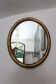 Oval mirror with gilded wood, Napoleon III medallion.