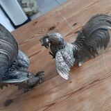 2 silver metal roosters