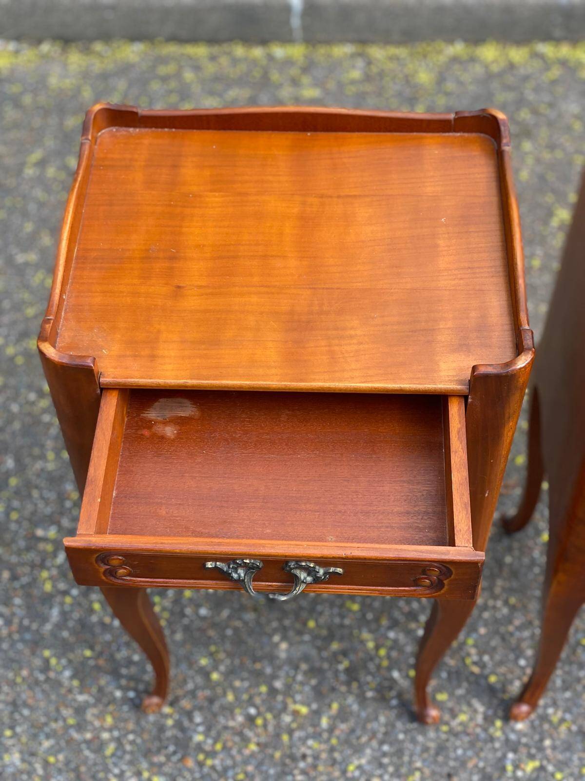 2 Louis XV bedside tables made of curved solid wood with drawers.