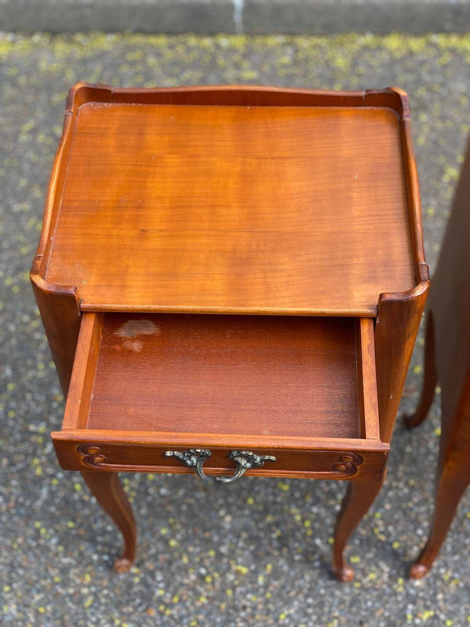 2 Louis XV bedside tables made of curved solid wood with drawers.
