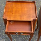 2 Louis XV bedside tables made of curved solid wood with drawers.