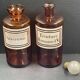 Antique apothecary pots in amber glass, set of 2 - 22 cm