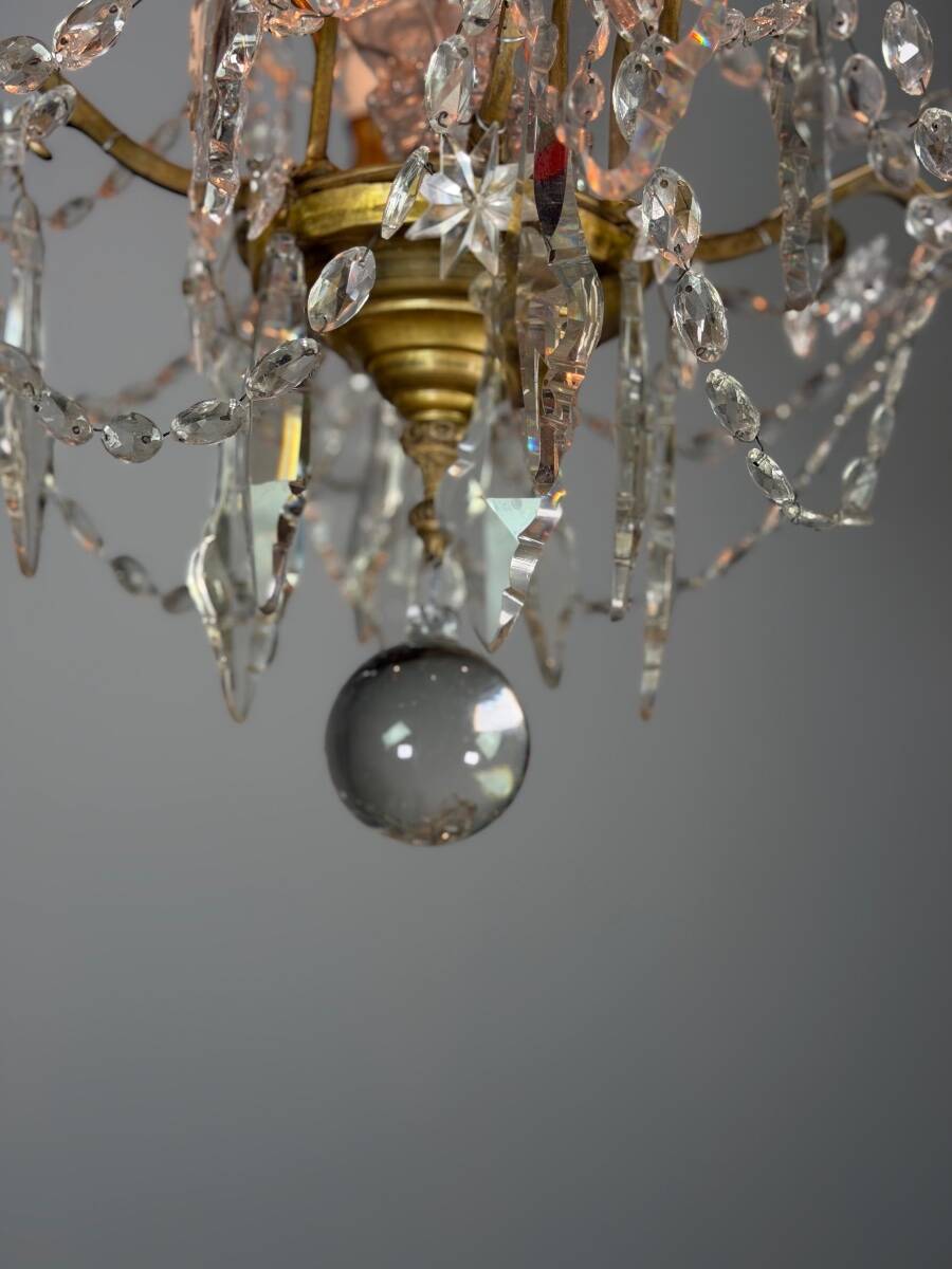 Bronze chandelier with cut crystal pendants, circa 1800.